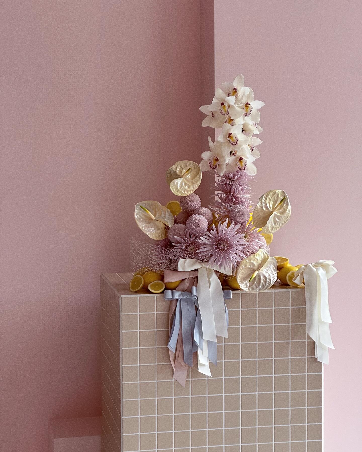 Starlight, star bright, baby.

Ivory, pearl, butter, lemon butter, lemon, marshmallow &amp; rose-champagne with pops of periwinkle + magenta. 

This piece was curated from a base of mixed-variety chrysanthemums dressed with custom coloured lemon pear