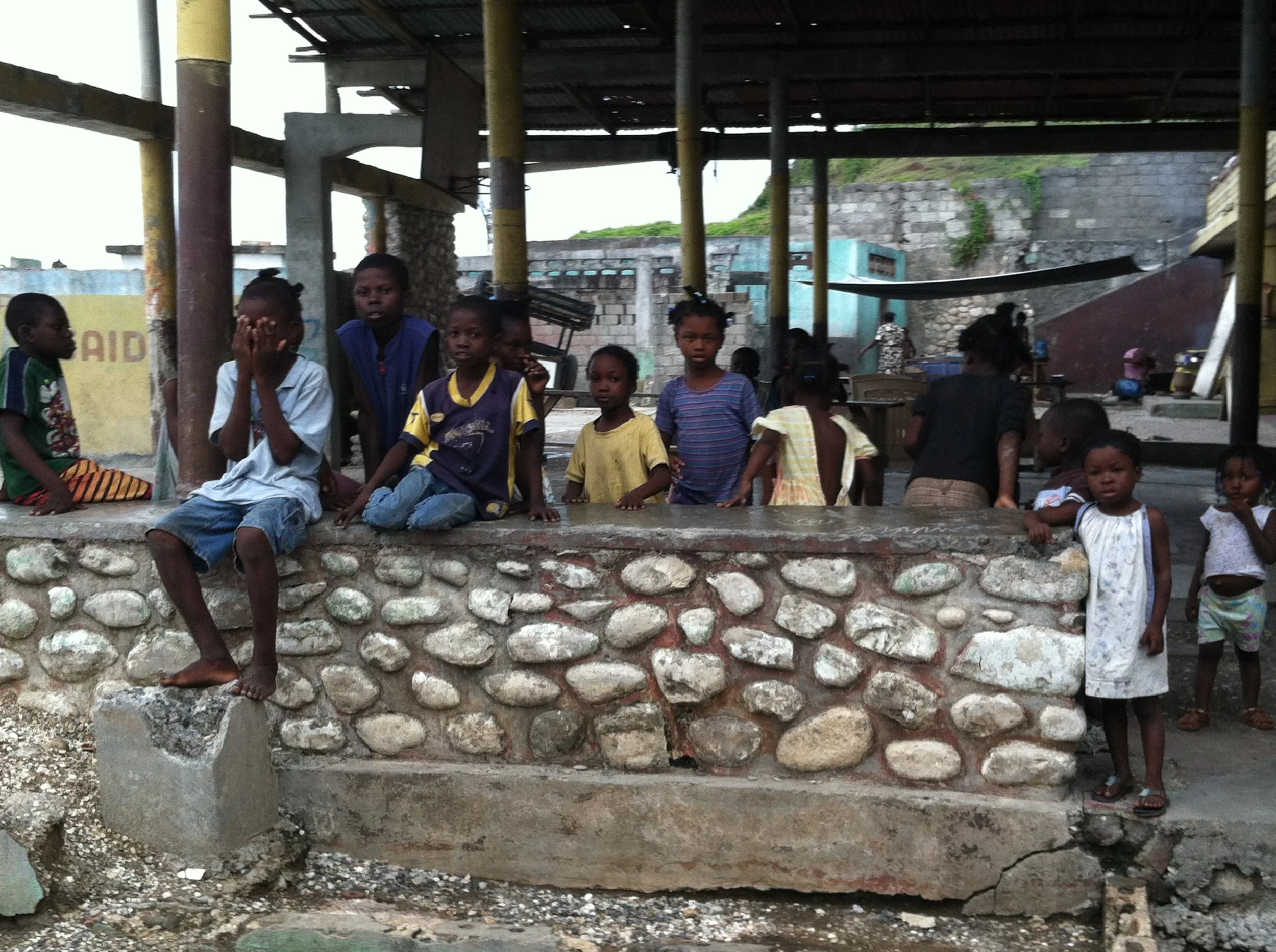 The week the children were told they had 30 days to leave the only home many of them knew....an abandoned nightclub in downtown Jeremie.