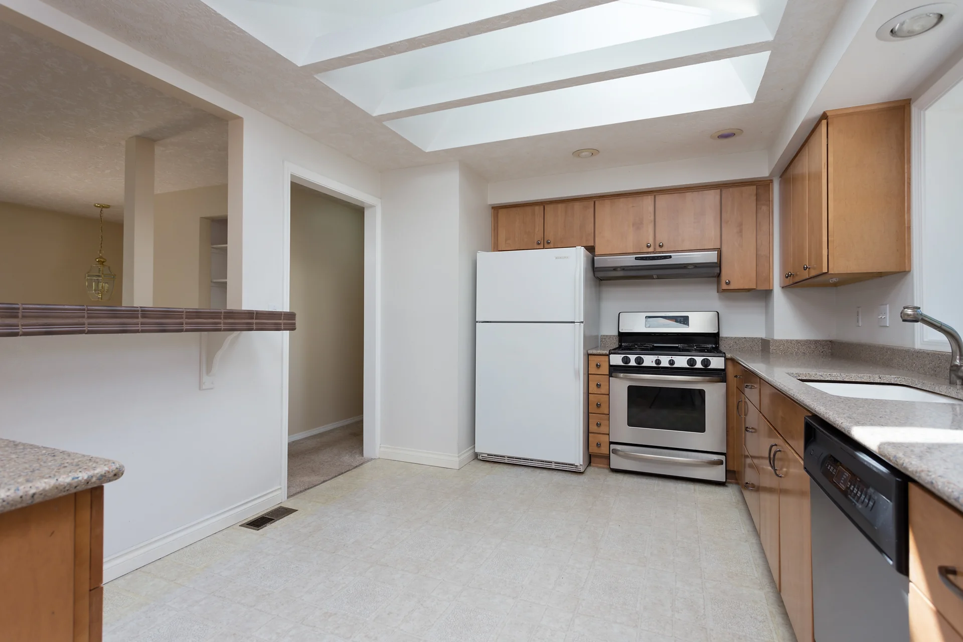 Skylights in the kitchen lend a bright and airy feel.