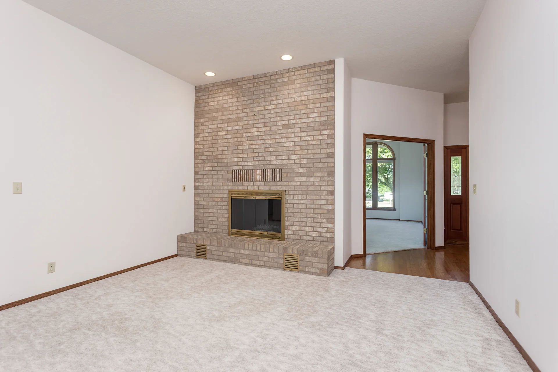 Unique floor plan. To the left of this room, is a formal dining room, and beyond, you can see the family room.
