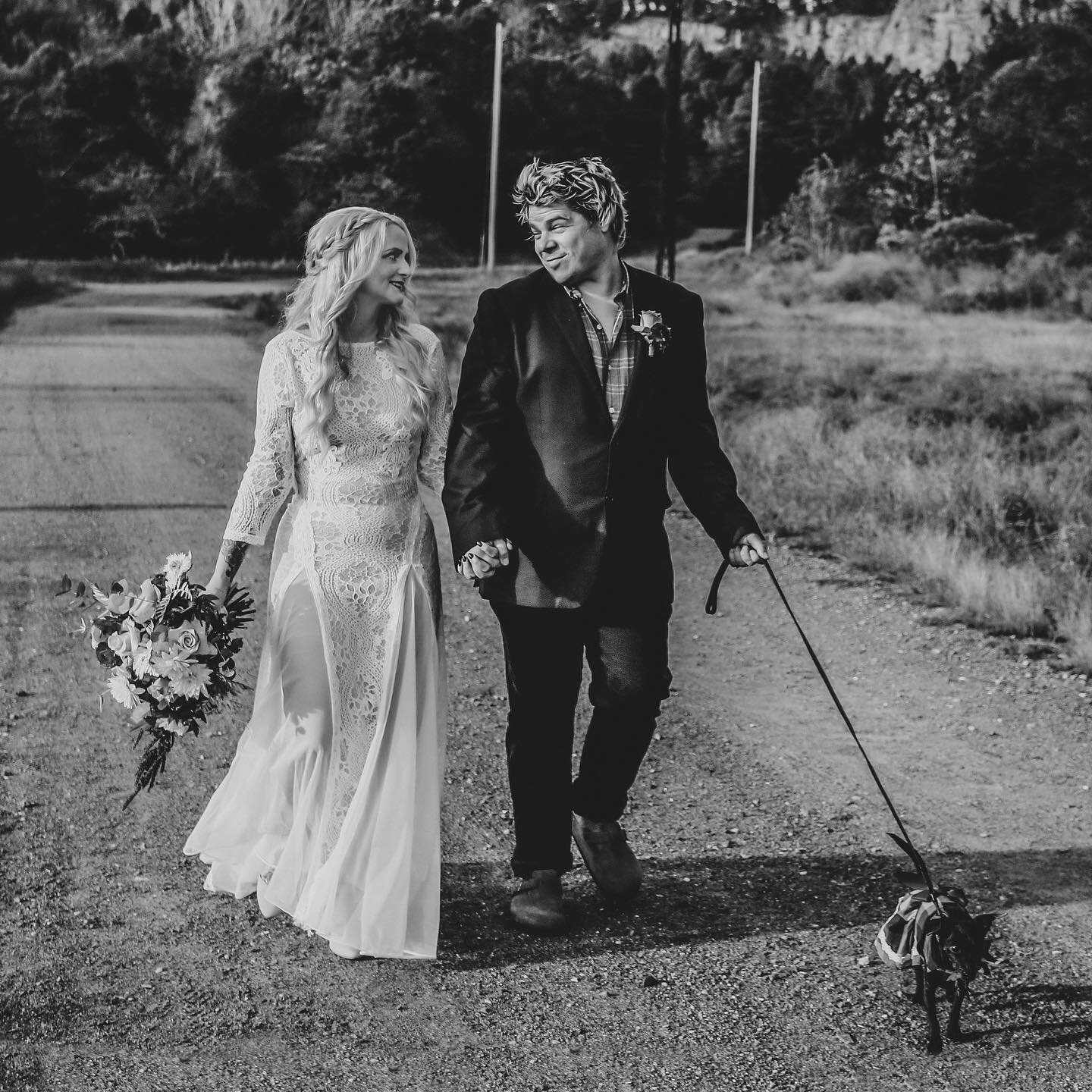 Cutest friggin&rsquo; couple 😍
Bouquet by @petaltothemetalar 
.
.
.
.
#weddingceremony #weddingportrait #elope #bride #stroll #justhitched #fallwedding #beautifulcouple #imagestyle #portraitmode #portraitmood #blackandwhite #bw #weddinginspo #weddin