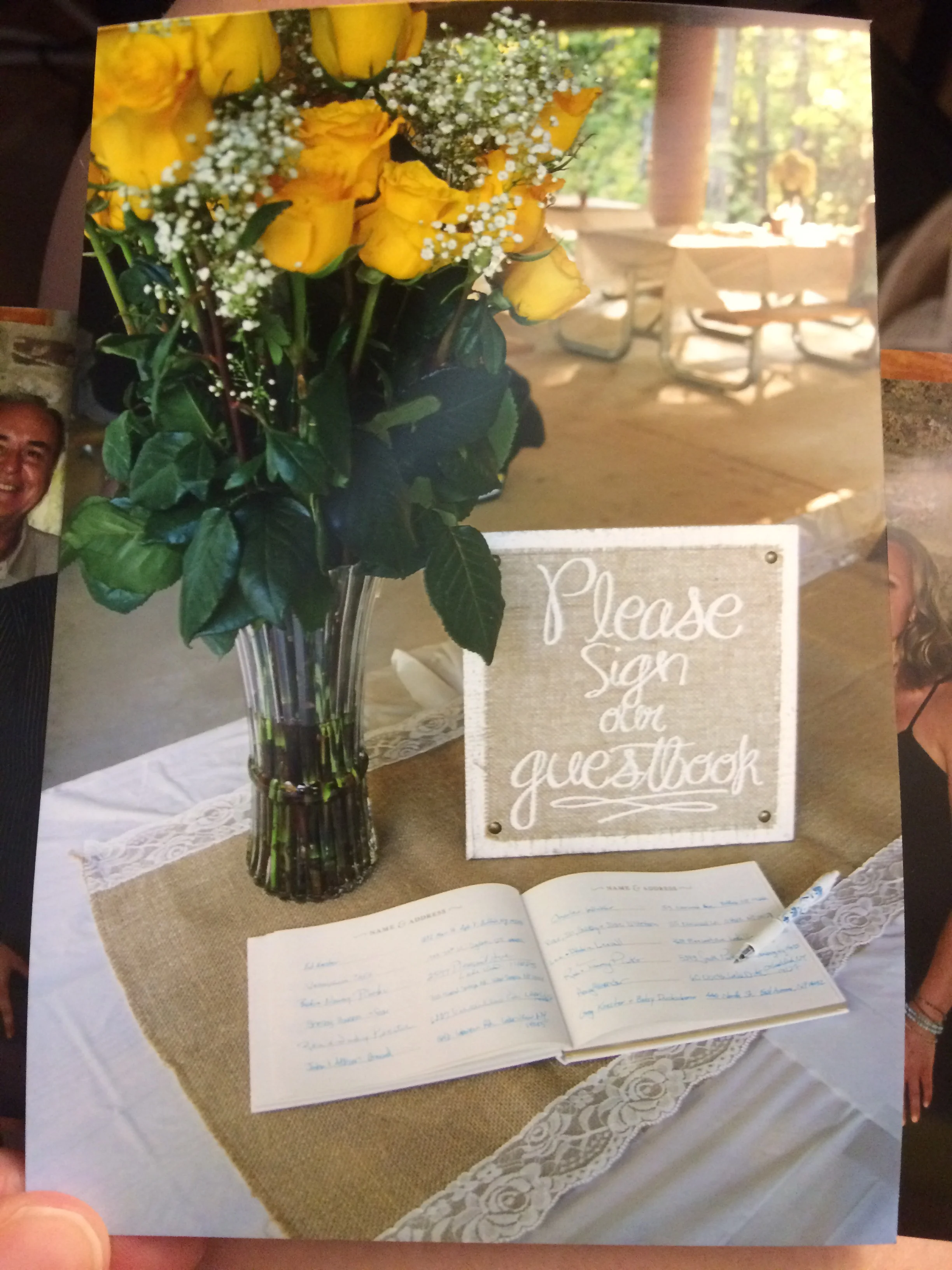 Our sign in book and yellow flowers picked out by my new niece.