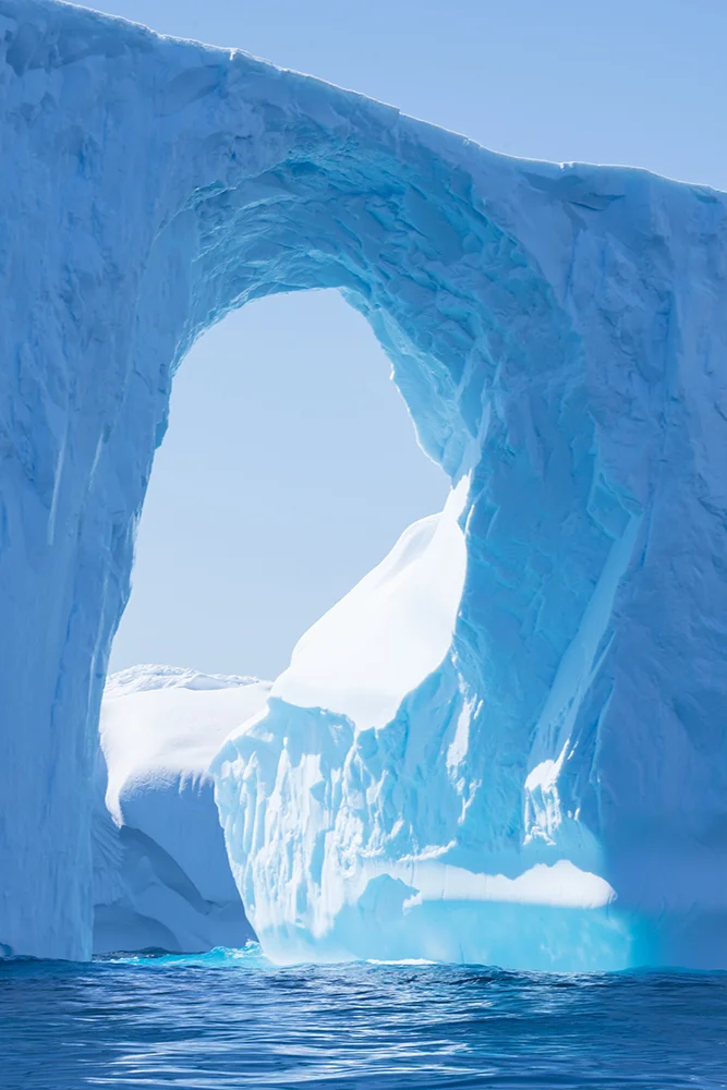 SUN SHINING ON ICEBERG IN ANTARCTICA (1)