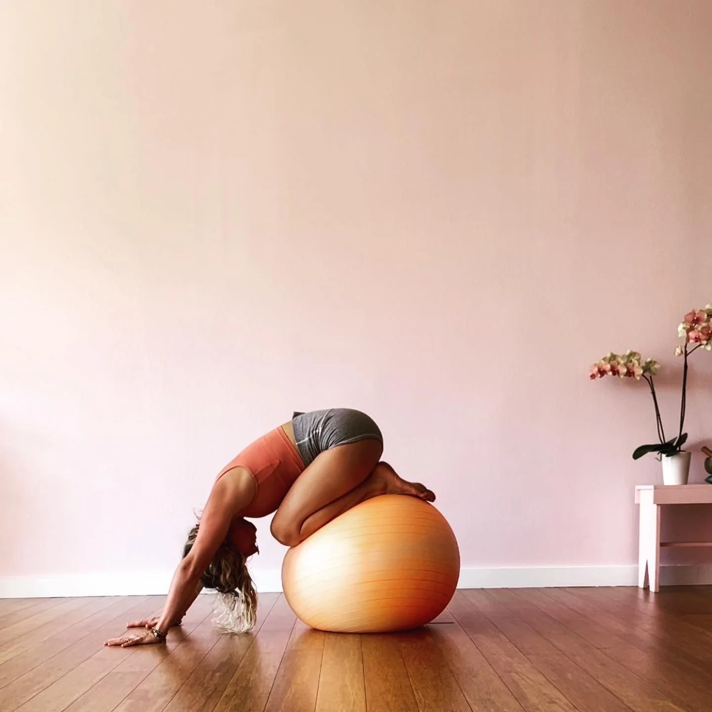 Child’s pose on ball.jpg