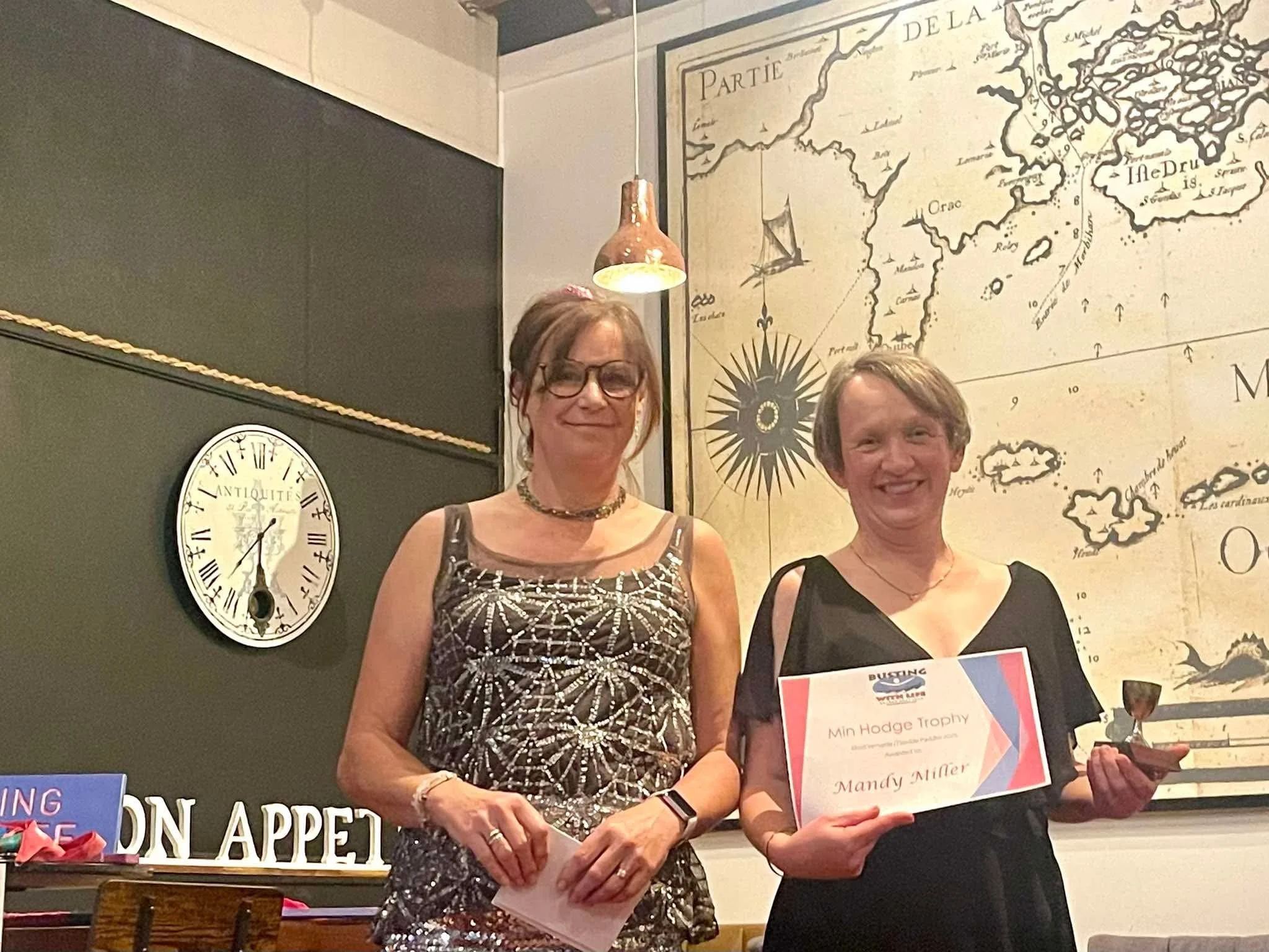  Min Hodge trophy recipient Mandy Miller presented by Jo Hooper - Busting With Life awards night at Rendezvous Cafe, Killarney Park, Lake Pupuke - May 2025 