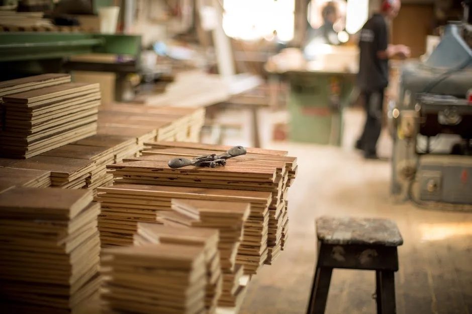 In the workshop at Charles Lowe and Sons , working on a commission for a bespoke Versailles panel design.