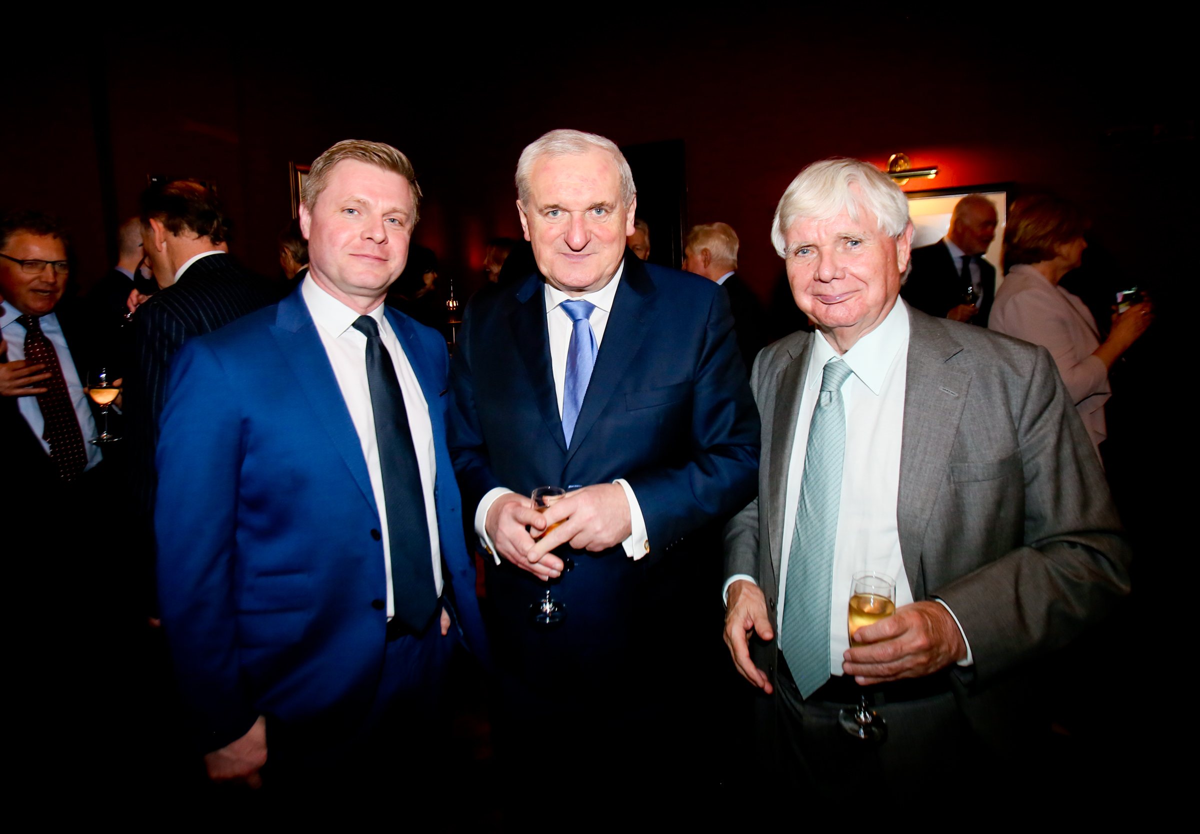  Former Taoiseach Bertie Ahern with Harcourt chairman Pat Doherty and son John Paul Doherty 