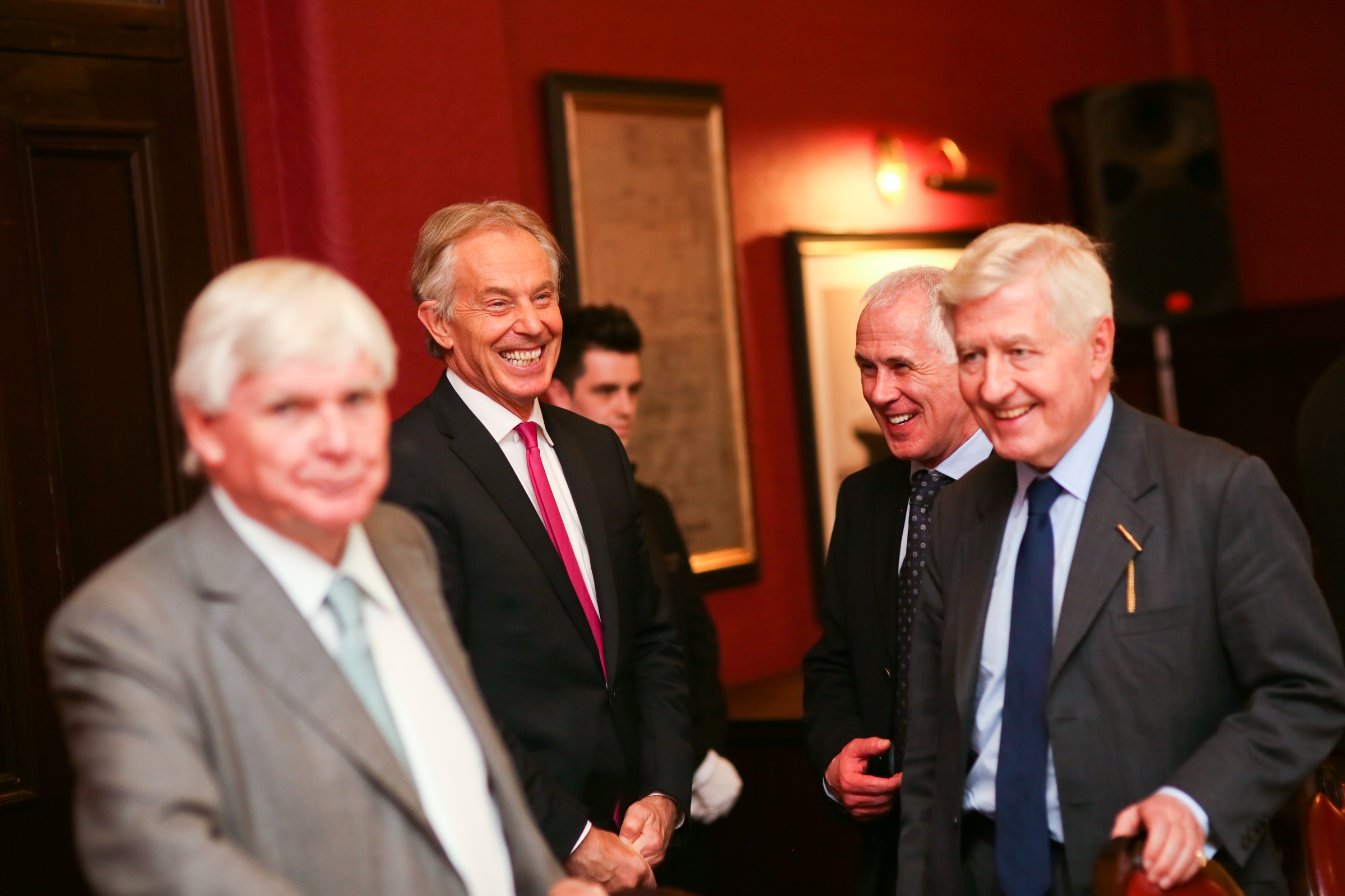  Tony Blair jokes with Co-operation Ireland chairman Christopher Moran 