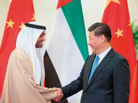 H.H. Sheikh Mohamed bin Zayed Al Nahyan greets President Xi during a trip to Beijing in December. Source: Gulf News (CC)