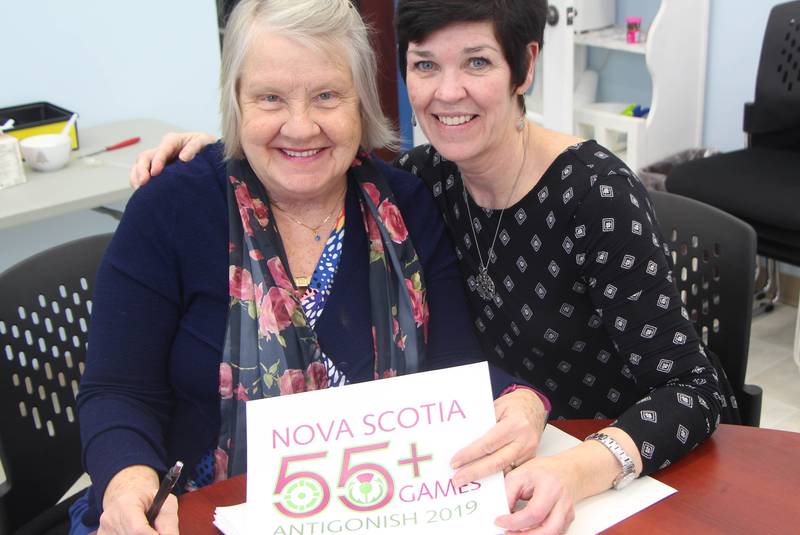 2019 Nova Scotia 55+ Games co-chair, veteran town councillor Diane Roberts, and town director of recreation and special events Tricia Cameron hold a copy of the event’s logo which has been recently approved by the provincial board. - Richard MacKenzie