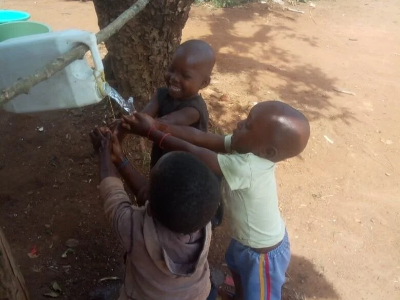 ASHIRAF MAKES SURE MIREMBE VILLAGE IS WASHING HANDS