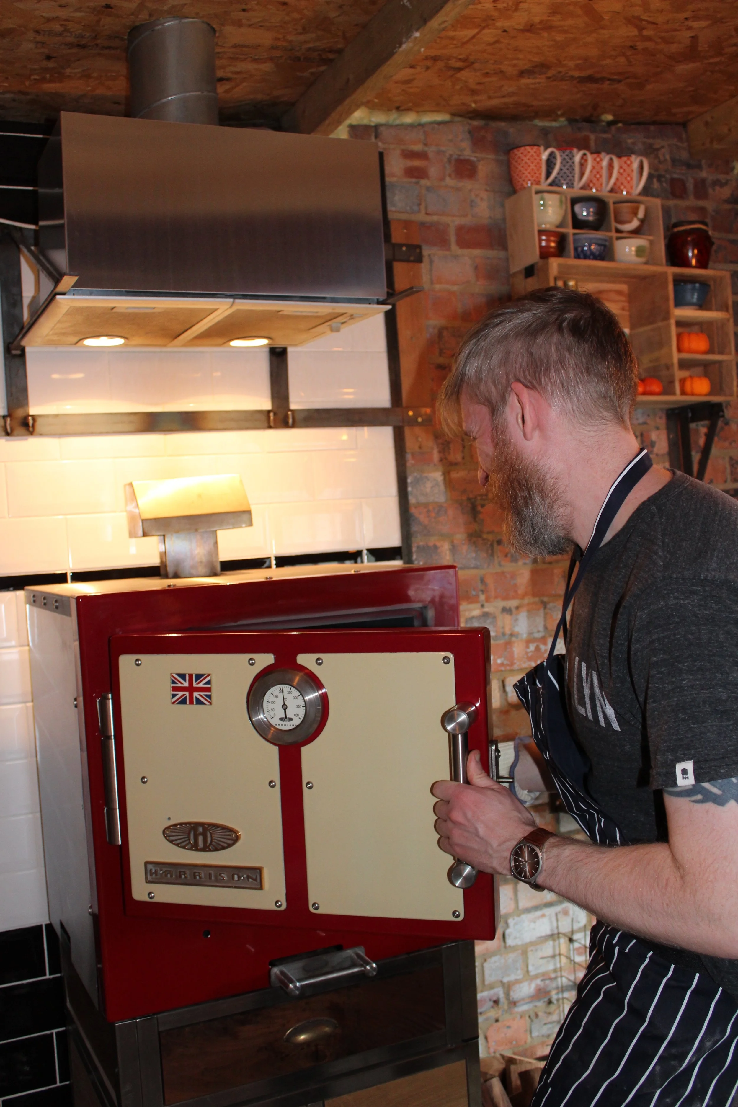 Daniel Thumwood, founder of Harrison Ovens making Welsh Manalitza Faggot in his Harrison Charcoal Oven.