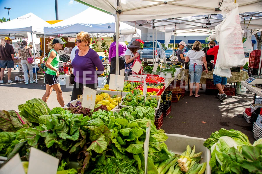 People shopping at the Cherry Creek Farmers Market
