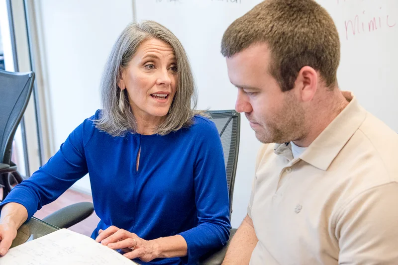 Business coach working with a client