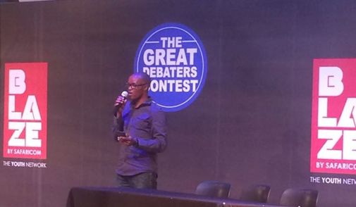 Ernest of the iMlango field team addresses the crowd