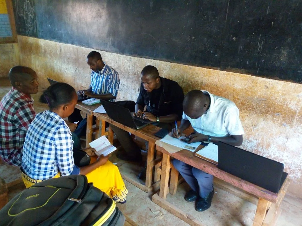 The team process one of the first Microloan applications in Makueni County
