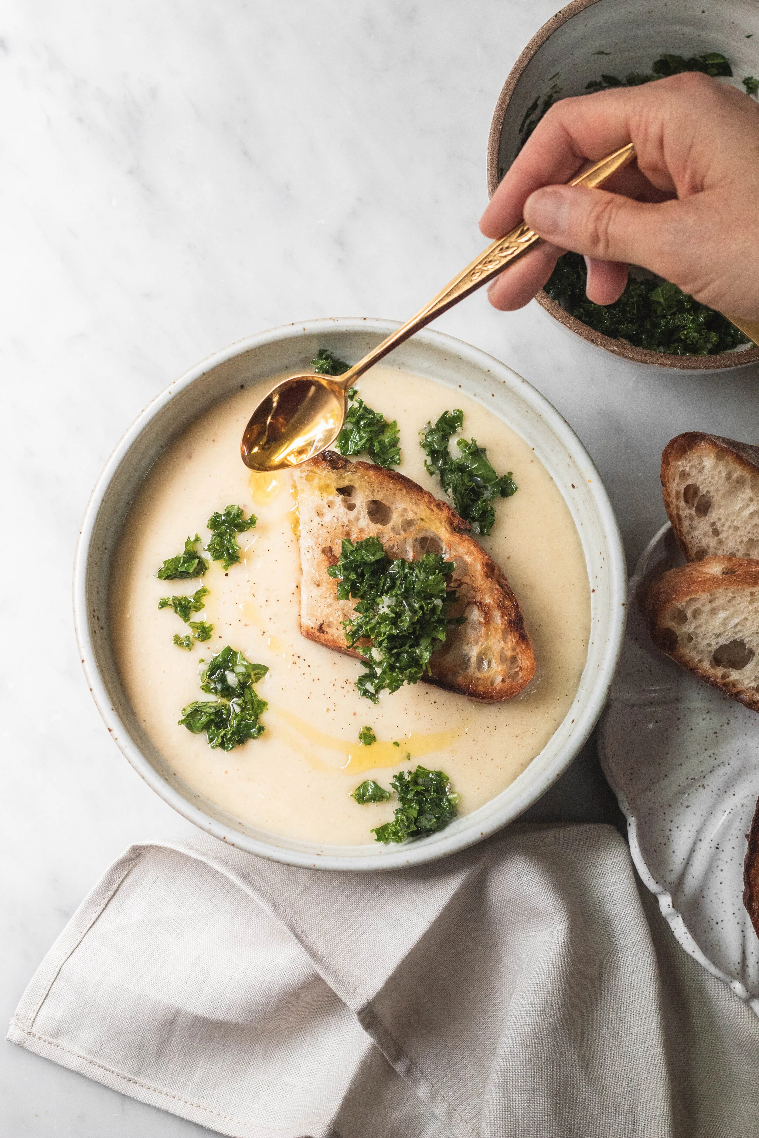 WHITE BEAN SOUP WITH CROUTONS AND SHAGGY KALE PESTO 
