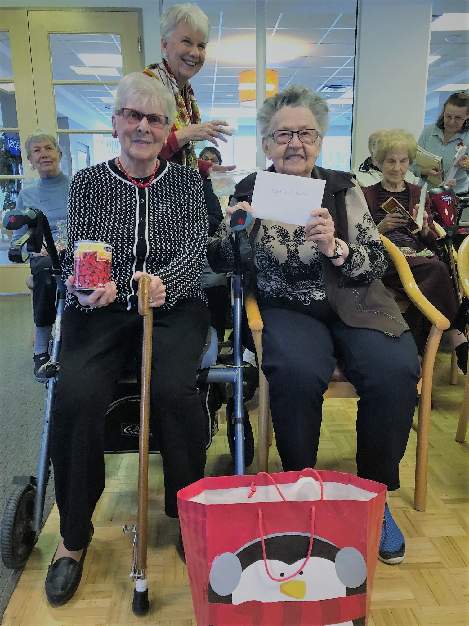 Eileen and Yvette from Les Floralies, LaSalle gave monies and canned goods for families in need at Christmas on behalf of the residents.