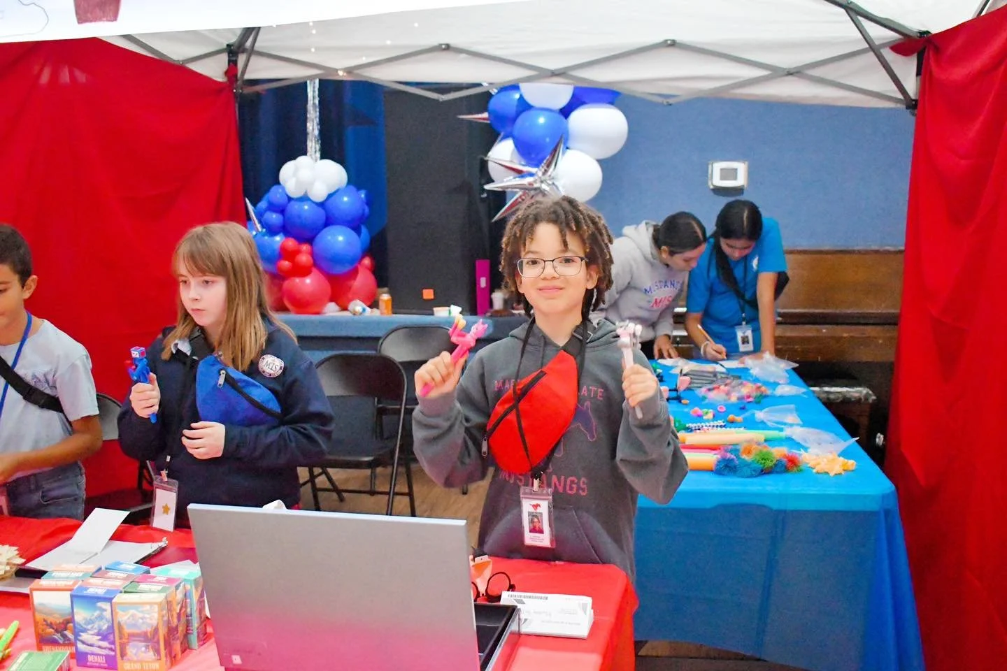 Our 4th grade students participated in the Mustang Market last week and it was full of fun and many practical life lessons too!

The children learned all about earning paychecks, running businesses, balancing checkbooks, and so much more. We had busi