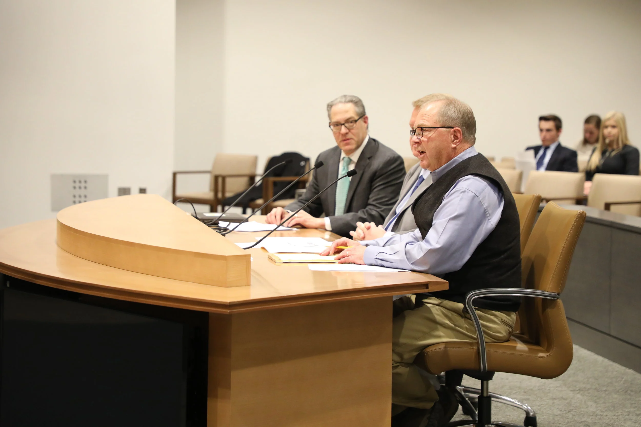 Lowell Pratt, Pratt Homes, and David Siegel, Housing First Minnesota Executive Director join Senator Rich Draheim in discussing SF3430 with the Senate Jobs Committee on Wednesday.