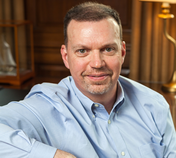 Picture of Tony Hansen in a light blue shirt