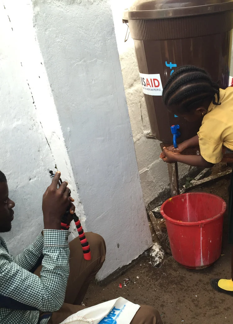 Participants in an OMPT Video Education Workshop demonstrate and record correct hand-washing techniques
