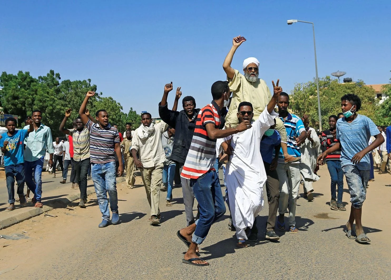 Sudanese protesters turn out near the home of a demonstrator who died of gunshot wounds. (Mohamed Nureldin Abdallah/Reuters) Source