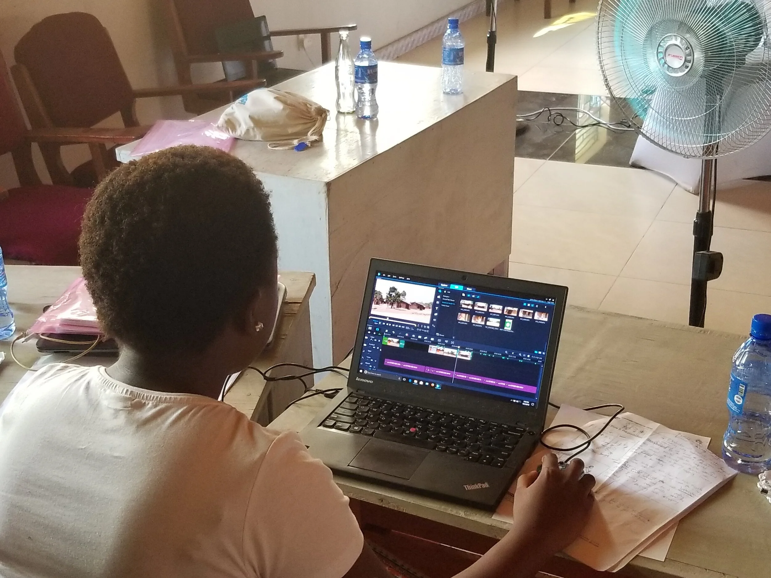 Noriah editing a video during the Video Education Workshop