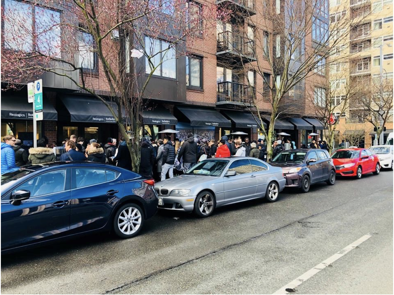 PICTURED ABOVE: The KODA Condominium development generated a line of prospective buyers that eagerly awaited the release of 203 homes for reservation on February 24th, 2018.