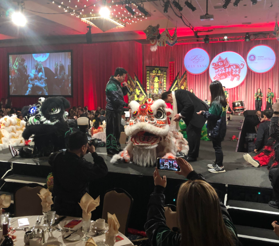 PICTURED ABOVE AND BELOW: Guests were treated to numerous productions and a live auction as they dined and sampled fine wines from Washington.