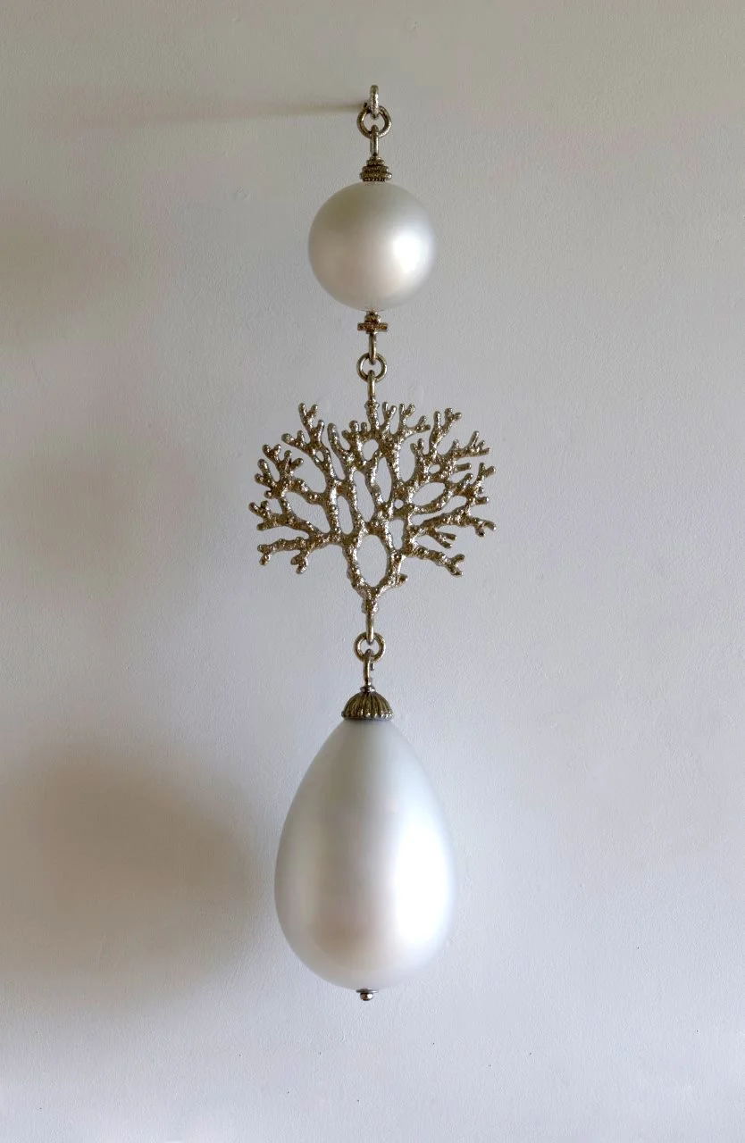 Polyp 3, 2015, nickel-plated bronze, mirrored blown glass. The work is suspended from a nickel-plated steel hook, 30 x 9 x 6 in