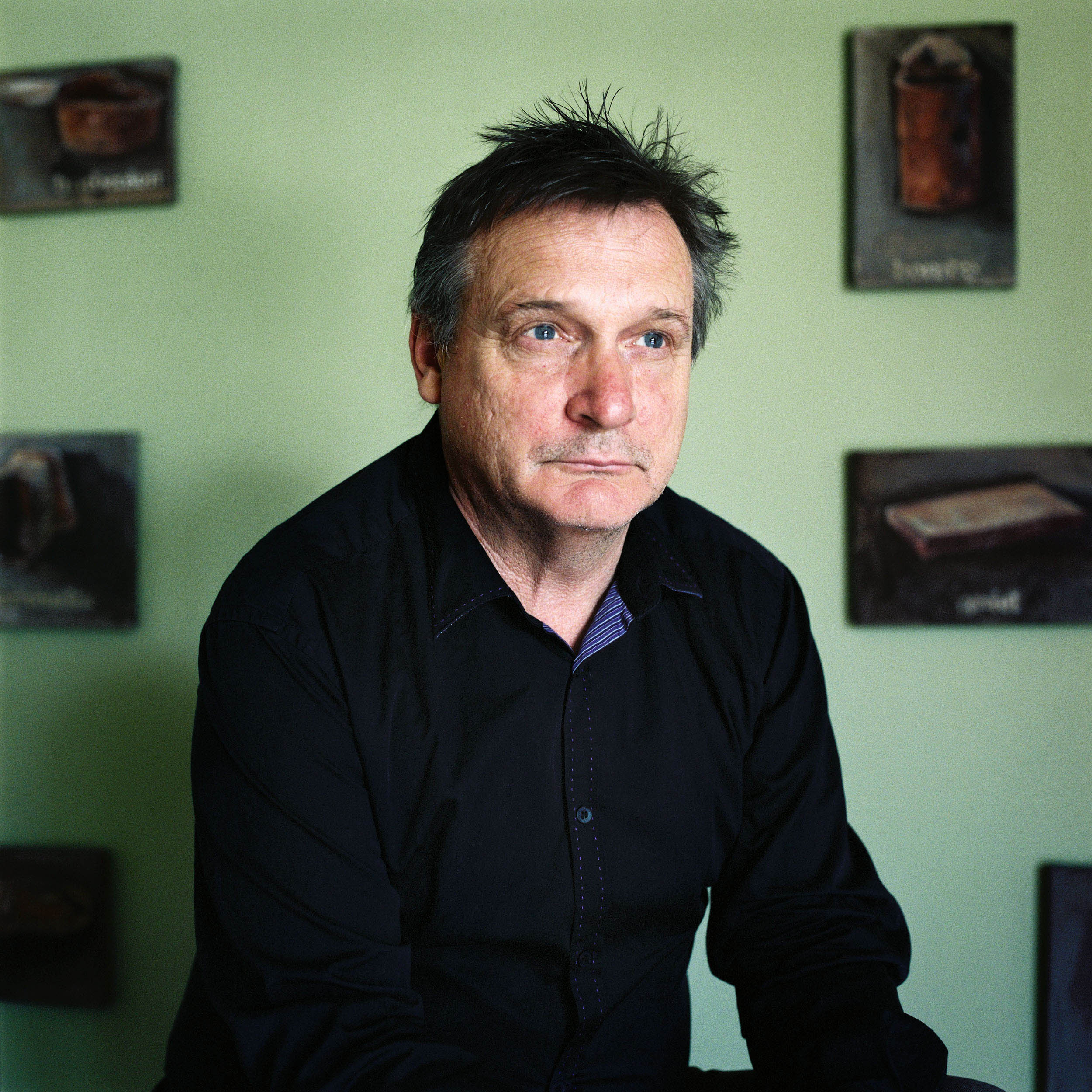 Artist Neil Fettling, Mildura, VIC, 2011 with paintings from his series titled 'Another Mallee History,' which explores early European settlement of the region. Drought and inappropriate farming practices meant that many of these properties failed. The discarded tin cans become "metaphors for the harshness of the climate, the lack of water, the lack of sustainability." - Interview, 04.11.11.