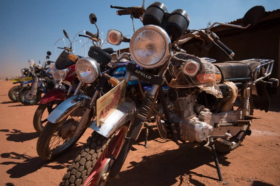 Motorcycles are fast becoming the preferred mode of travel to access areas and transport goods between markets. Photo: Chris Boyes