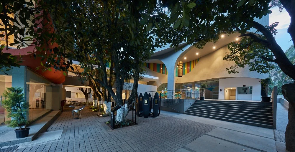 The entrance to the Indian Music Experience in Bangalore, India. The unusual curved design emerged from a competition open to young architecture practices in Bangalore. “We invited them to give their vision of how they envisioned a music museum in Bangalore. We told them ‘no trees must be cut’, so the building waves in and out of the jackfruit and mango trees in the site,” says museum director Manasi Prasad. All images courtesy of the Indian Music Experience.