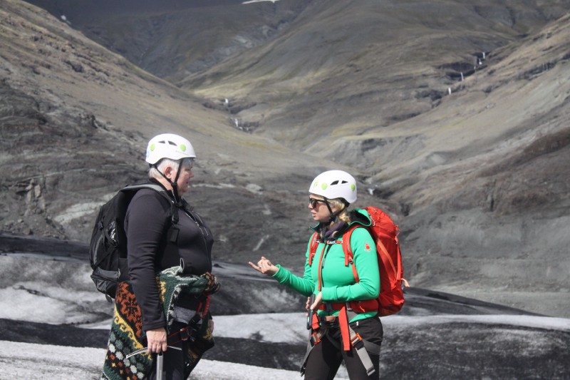 M Jackson (right) collects stories from Icelandic people about their relationship with the glaciers that surround them. Photo: Patricia Hensley