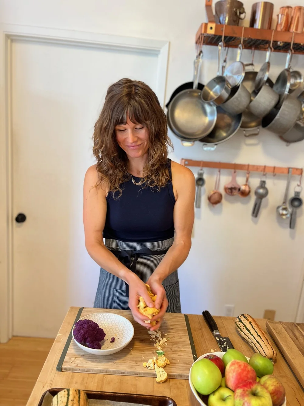 Jeanne Norsworthy preparing a healthy meal in her kitchen