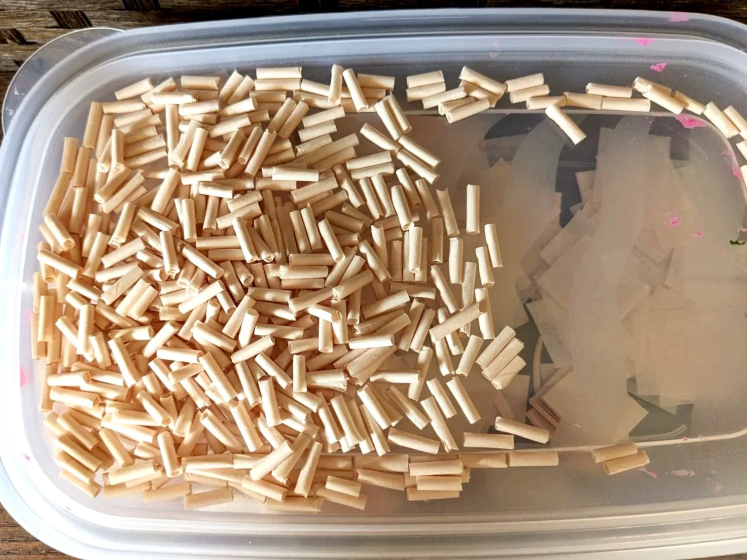 The tissue paper pieces have a lot of upfront work.  Each tiny cylinder is individually rolled prior to being applied to the paper backing. 