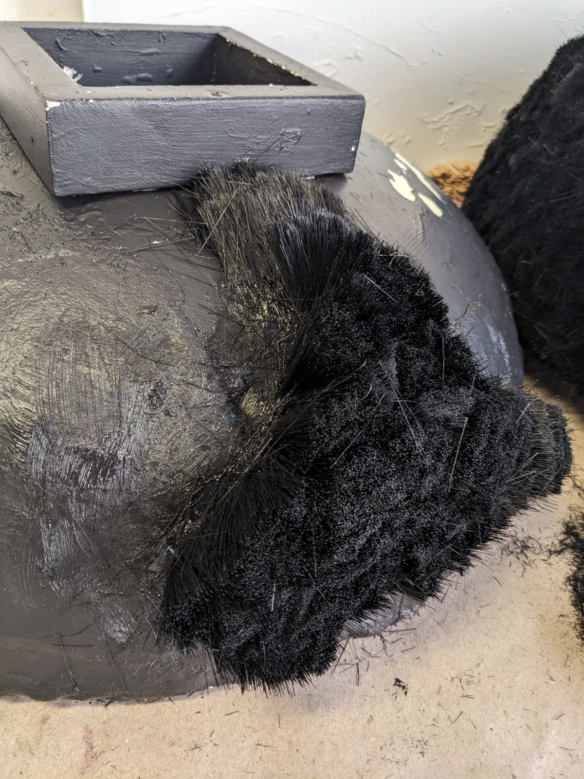 The beginning stages of a bristle sculpture, showing the substructure and support. 