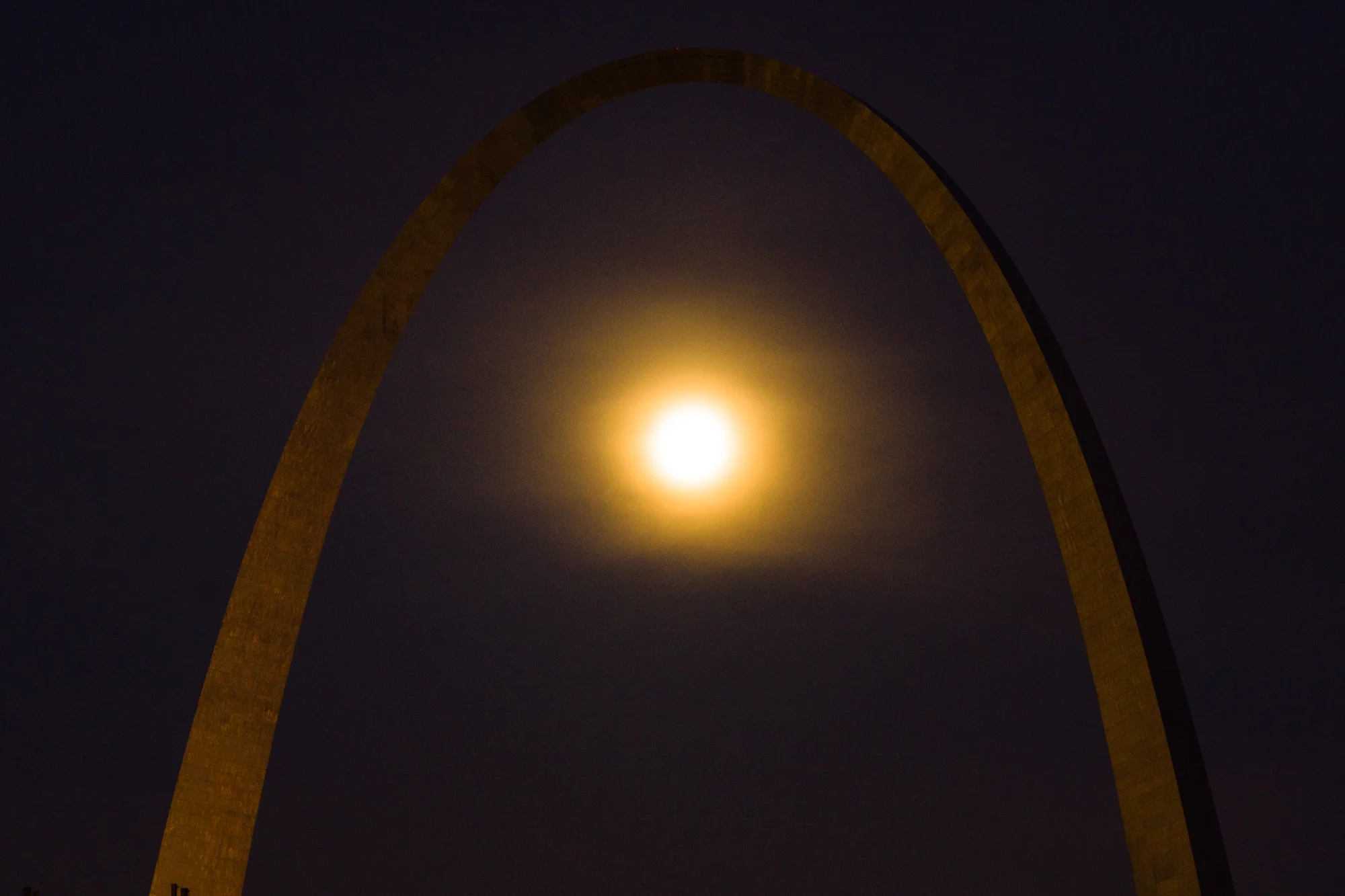 This was the second shot that I did. To see the arch I had to lose detail in the moon. I was not happy with that. I took another couple of shots with the idea that if my move to a new location didn't work I could combine the photos. My friend in St. Louis says this is the best image of the Arch he has ever seen.