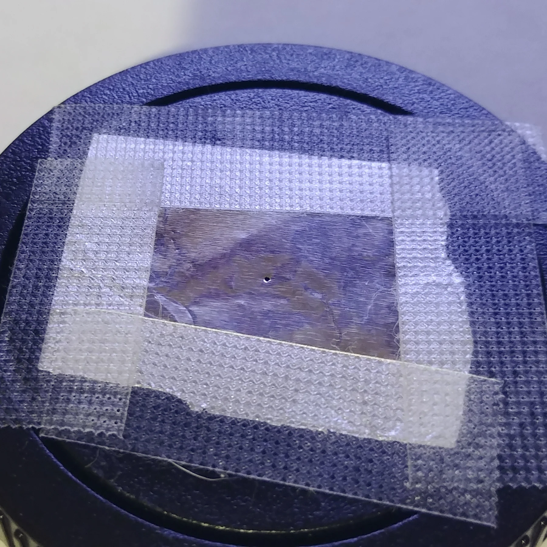 After finding the smallest pin or needle that you can get your hands on, insulin and subcutaneous needles work well they are less than half a mm this is a 27G needle which is 0.4mm hole, gently poke a perpendicular hole as close to the center of the body cap as you can.