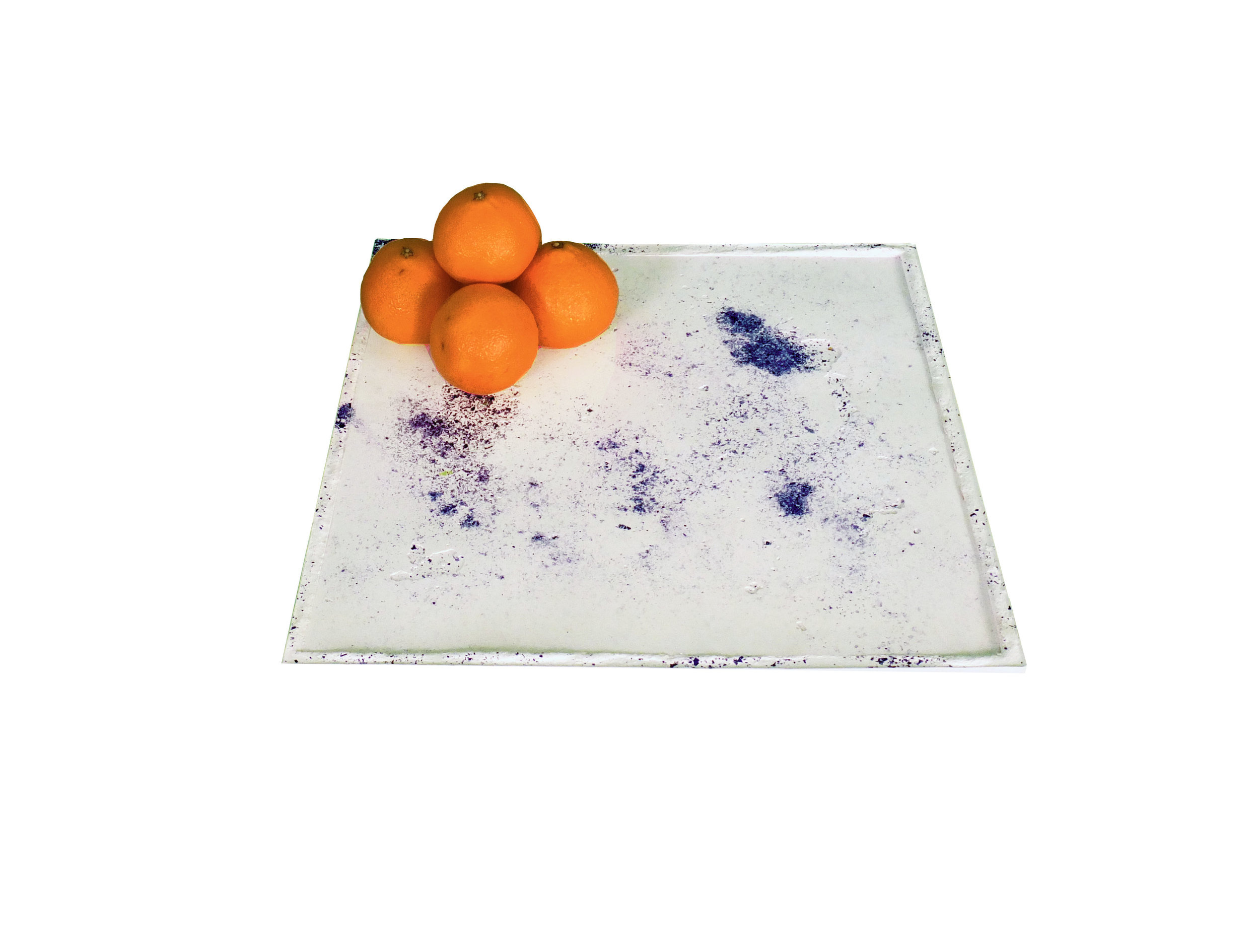 Blue concrete tray with oranges