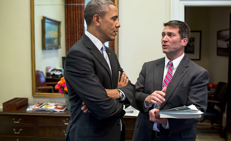President Obama speaks with Dr. Ronny Jackson (RIGHT)/Photo by White House photographer Pete Souza