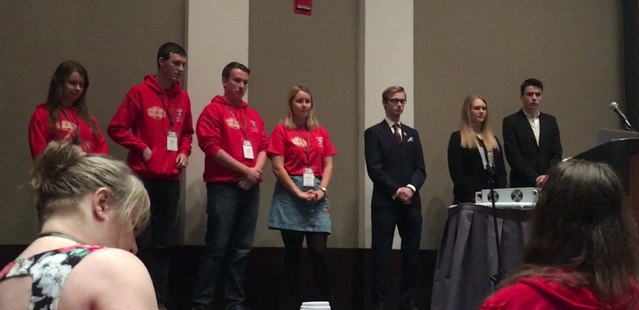Our team post-speech on the stage in Boston, MA