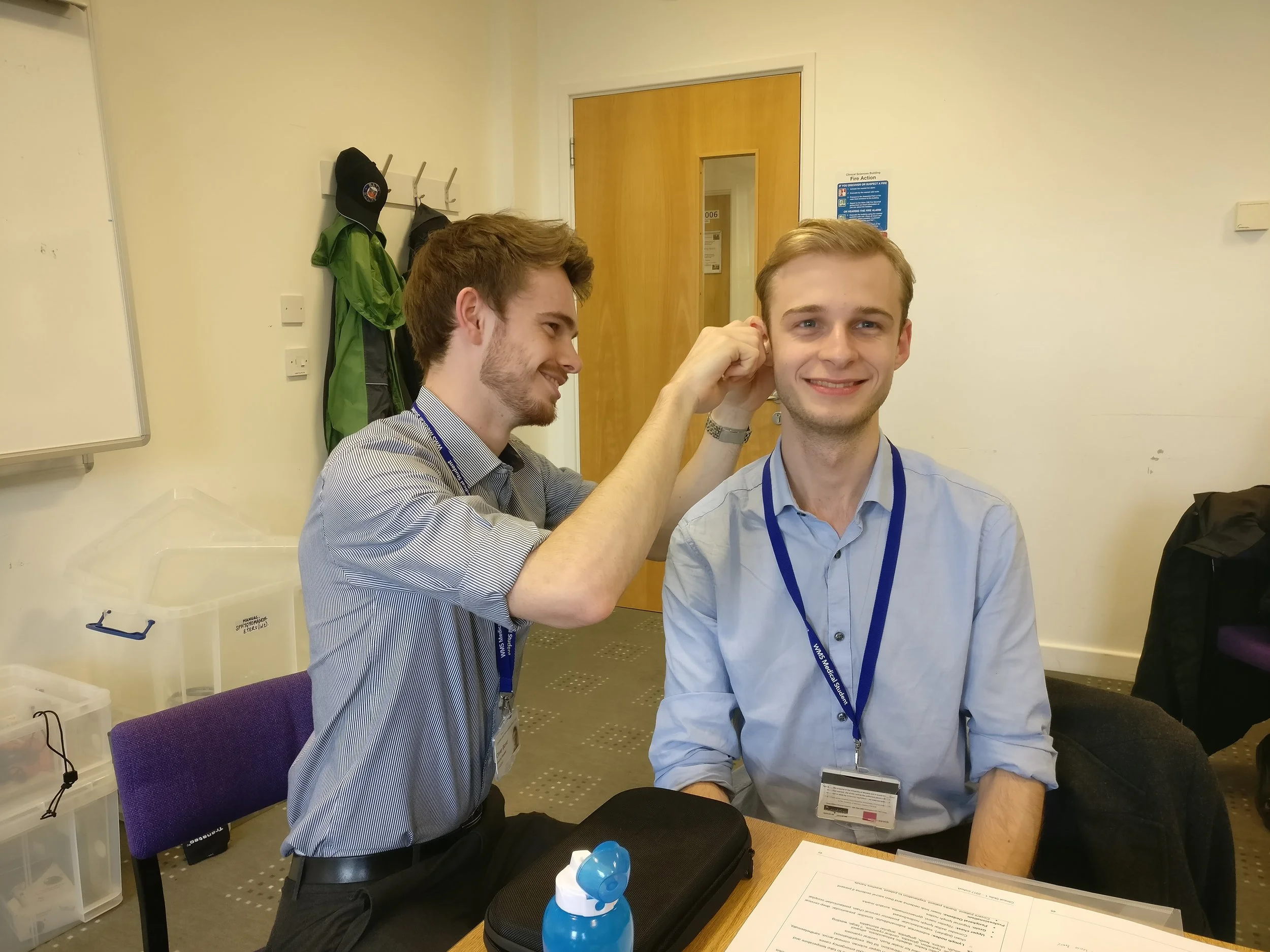Internal temperature taking via the ear
