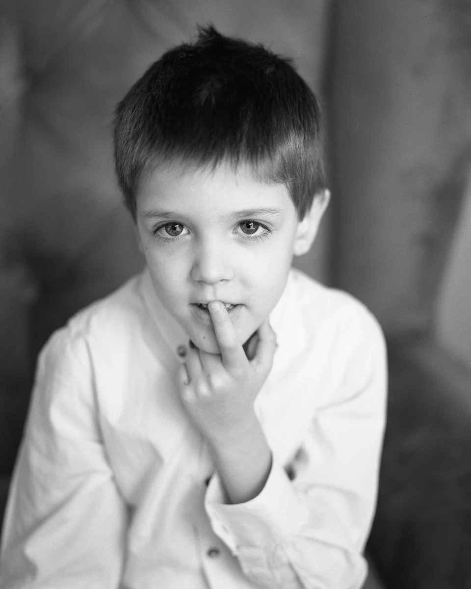 A portrait of my son. Look at the details around the eyes. Ilford Delta 400 was used and PG 100mm F3.5 wide open.