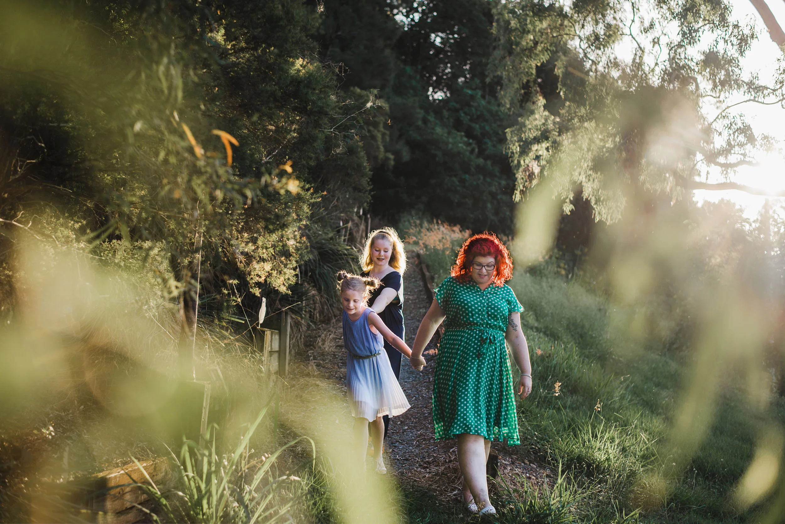 Katy Bindels Brisbane family Photographer walking-down-hill.jpg