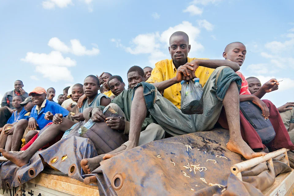 I took this photograph in Mozambique on a drive to South Africa. Their eyes tell a deep rooted story, and I was curious about the Chinese characters on the side of their truck. “The Chinese are building things in exchange for mining rights, timber rights, fishing rights, and these are absolutely bad deals.” - Jim LaFleur, senior economist for Mozambique’s largest business association. “China is very clear about what it wants from Africa. Africa has absolutely no idea what it wants from China.” - Lucy Corkin, Centre for Chinese Studies, Stellenbosch University
Image © Reuben Hernandez