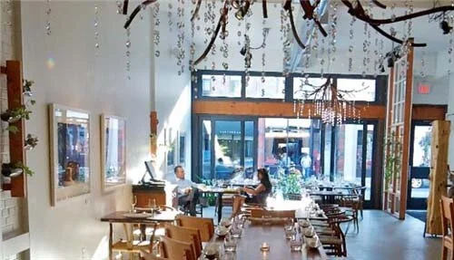 Solid walnut wood branches chandelier with Swarovski crystals in Bohmer restaurant Toronto