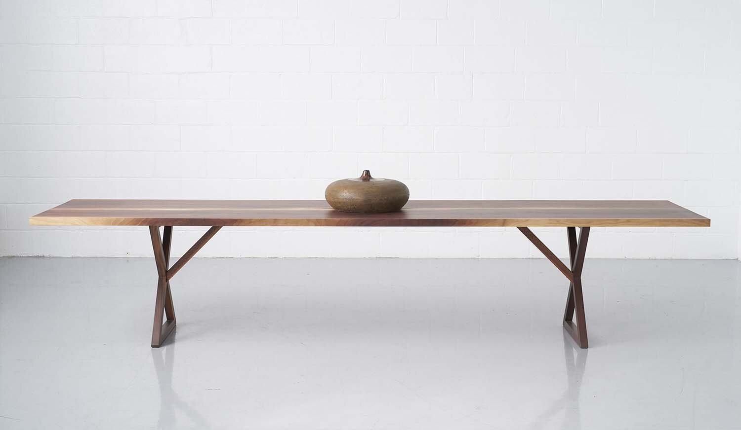 Handmade-solid-walnut-crossVI-table-primary.jpg