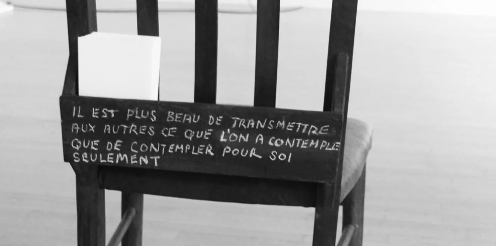 Title: ‘Contemplation is nothing else than a secret’ (St. Thomas Aquinas) Materials: one Cathedral chair, a box to post written postcards in and a pen. Position: facing the windows in the direction of artist Loren Beven’s window piece. Concept: